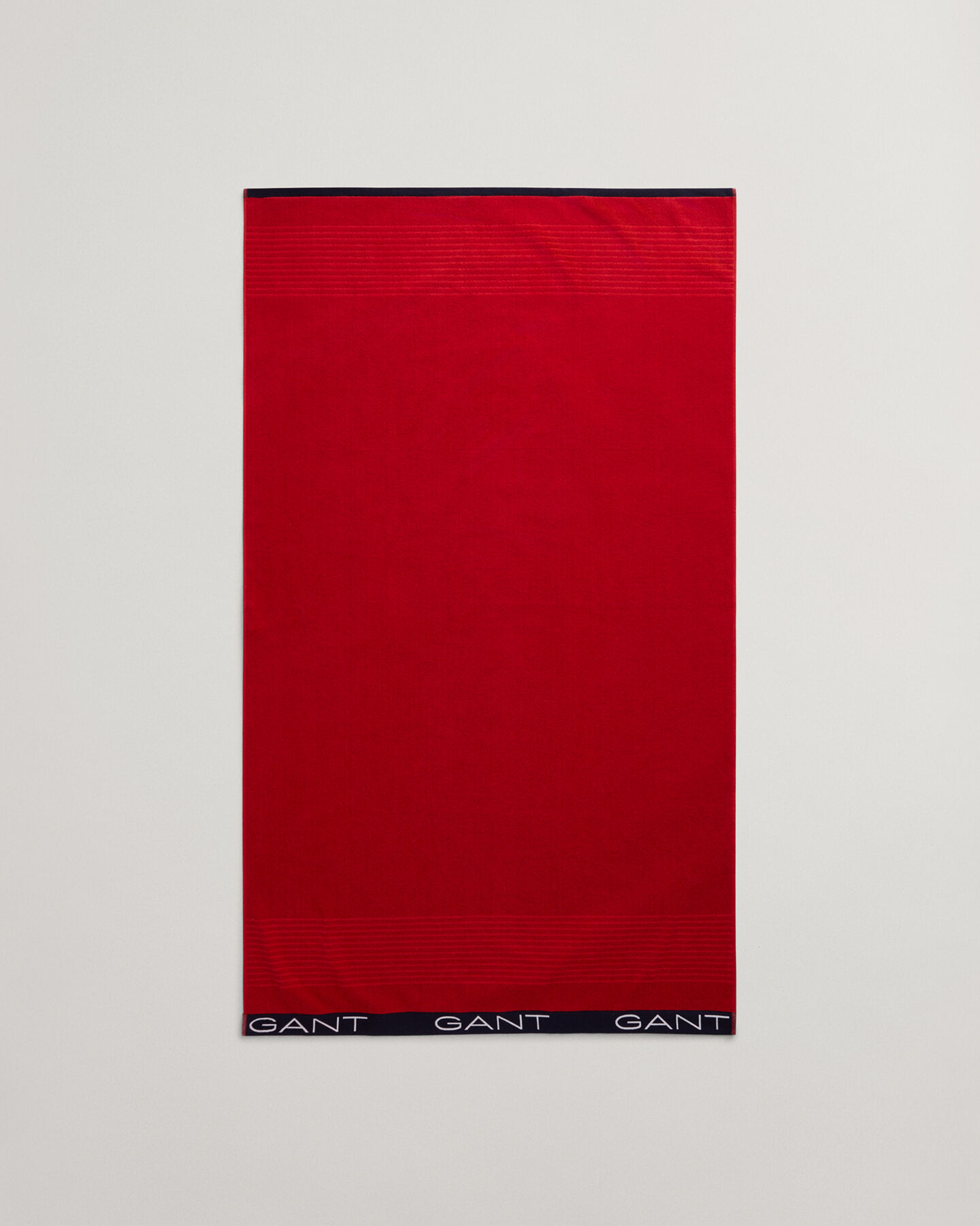 Strandhåndklæde med tonale striber