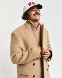 Dobbeltradet uldfrakke