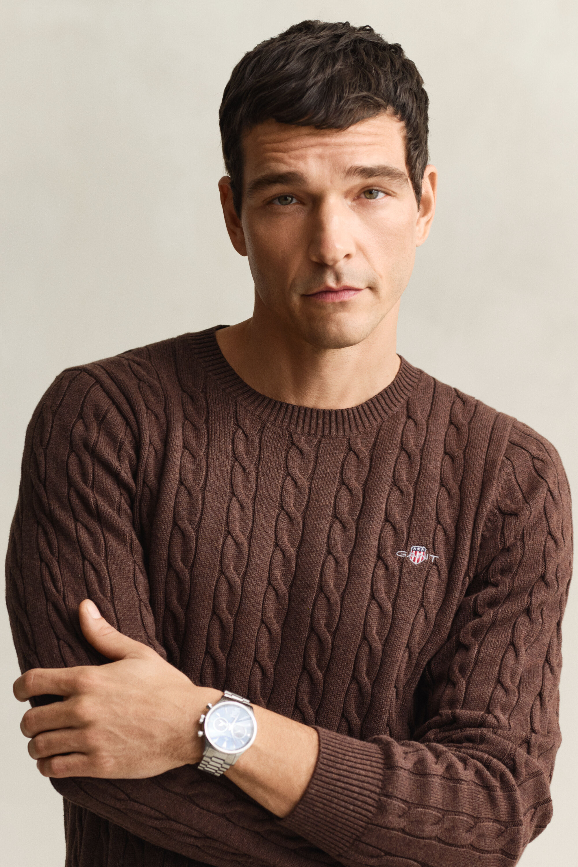 Crewneck sweater af bomuld med kabelstrik