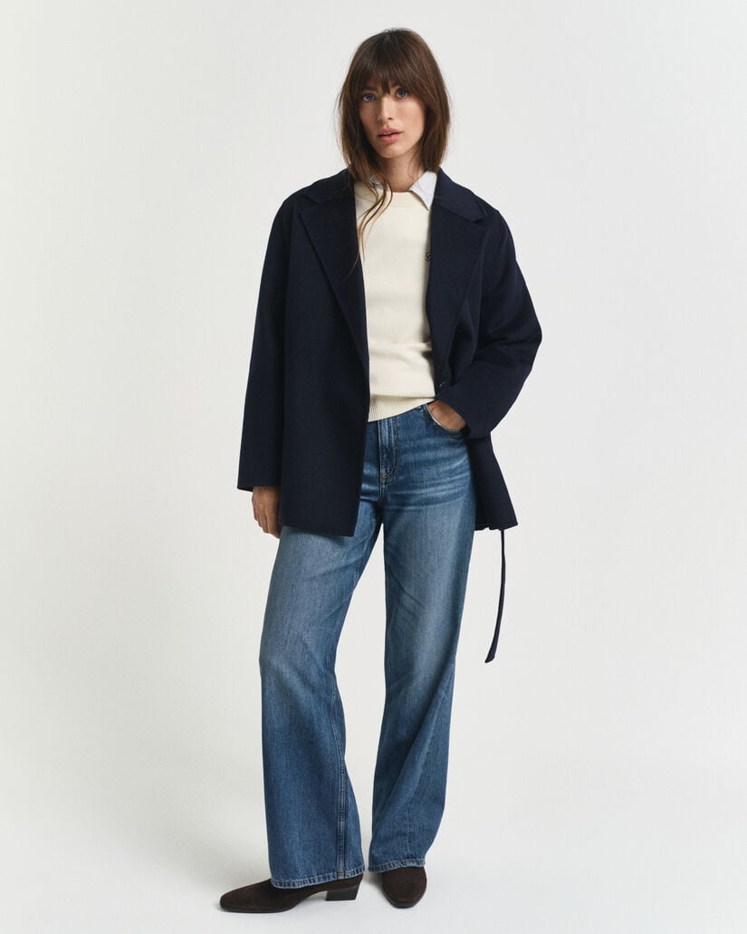 Håndsyet jakke med bælte