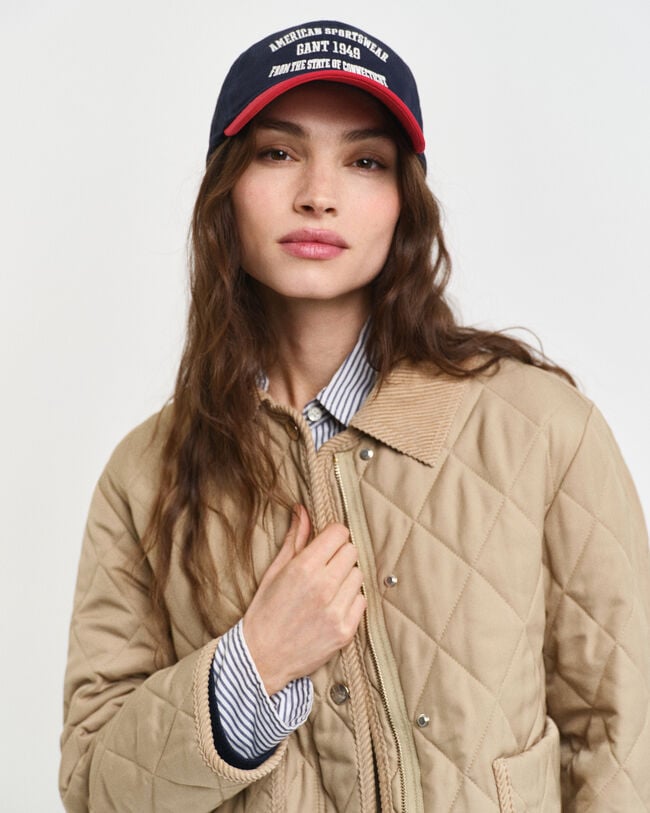 Quiltet jakke med detaljer i jernbanefløjl