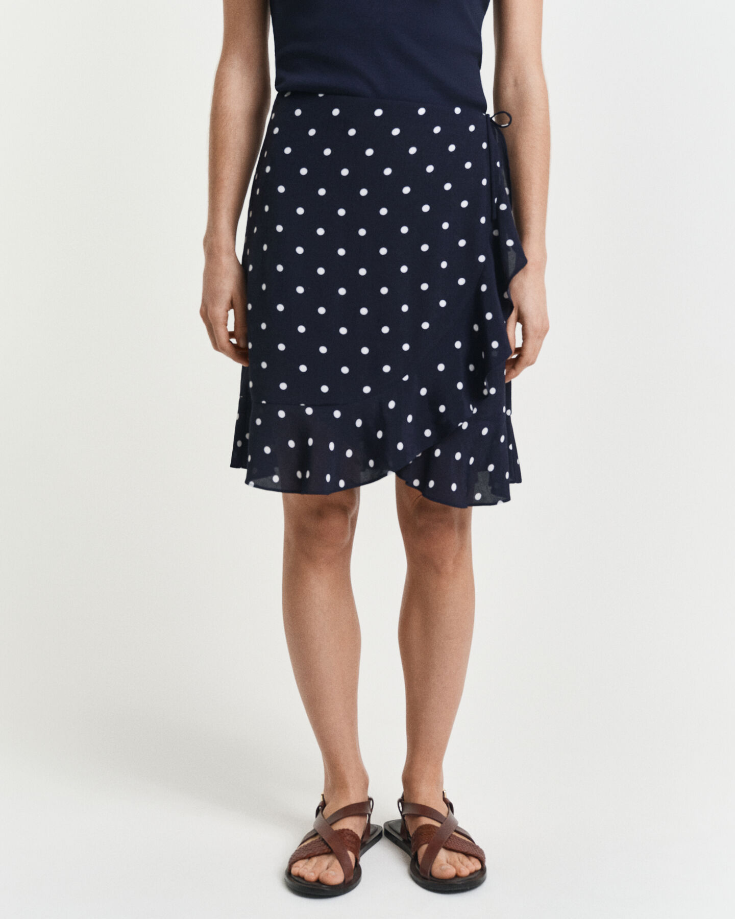 Flæset nederdel med prikket tryk