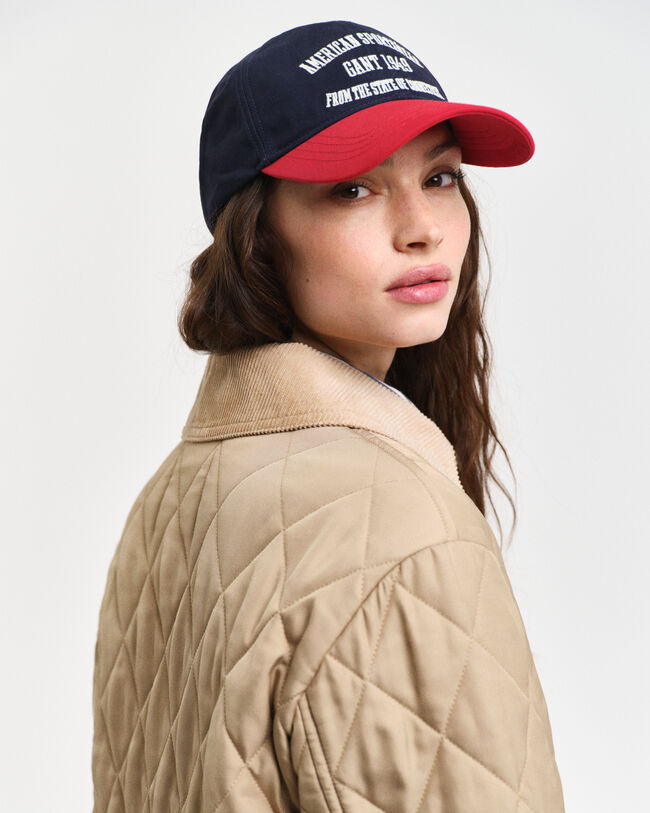 Quiltet frakke med detaljer i jernbanefløjl