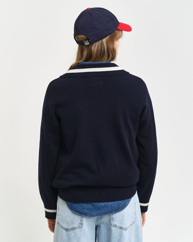 Kontrastfarvet sweater med V-hals af ekstra fin lammeuld