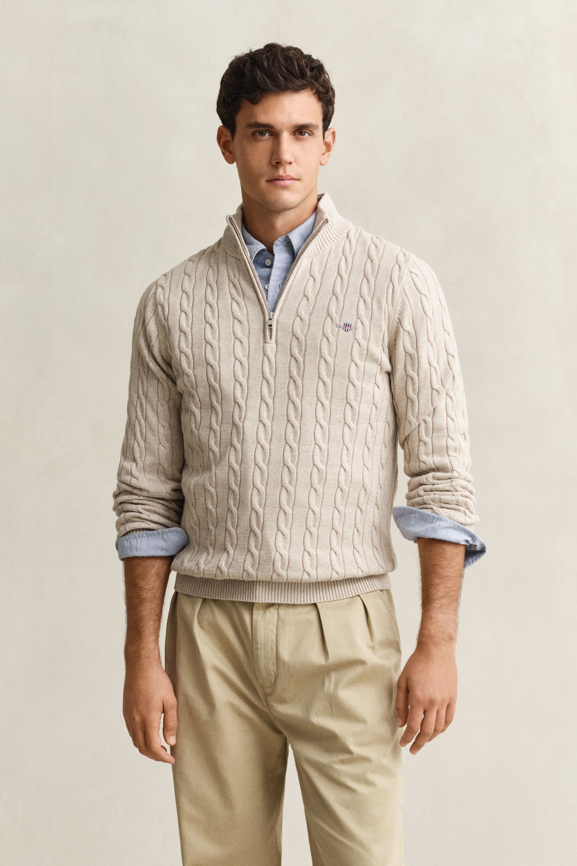 Kabelstrikket sweater af bomuld med halv lynlås