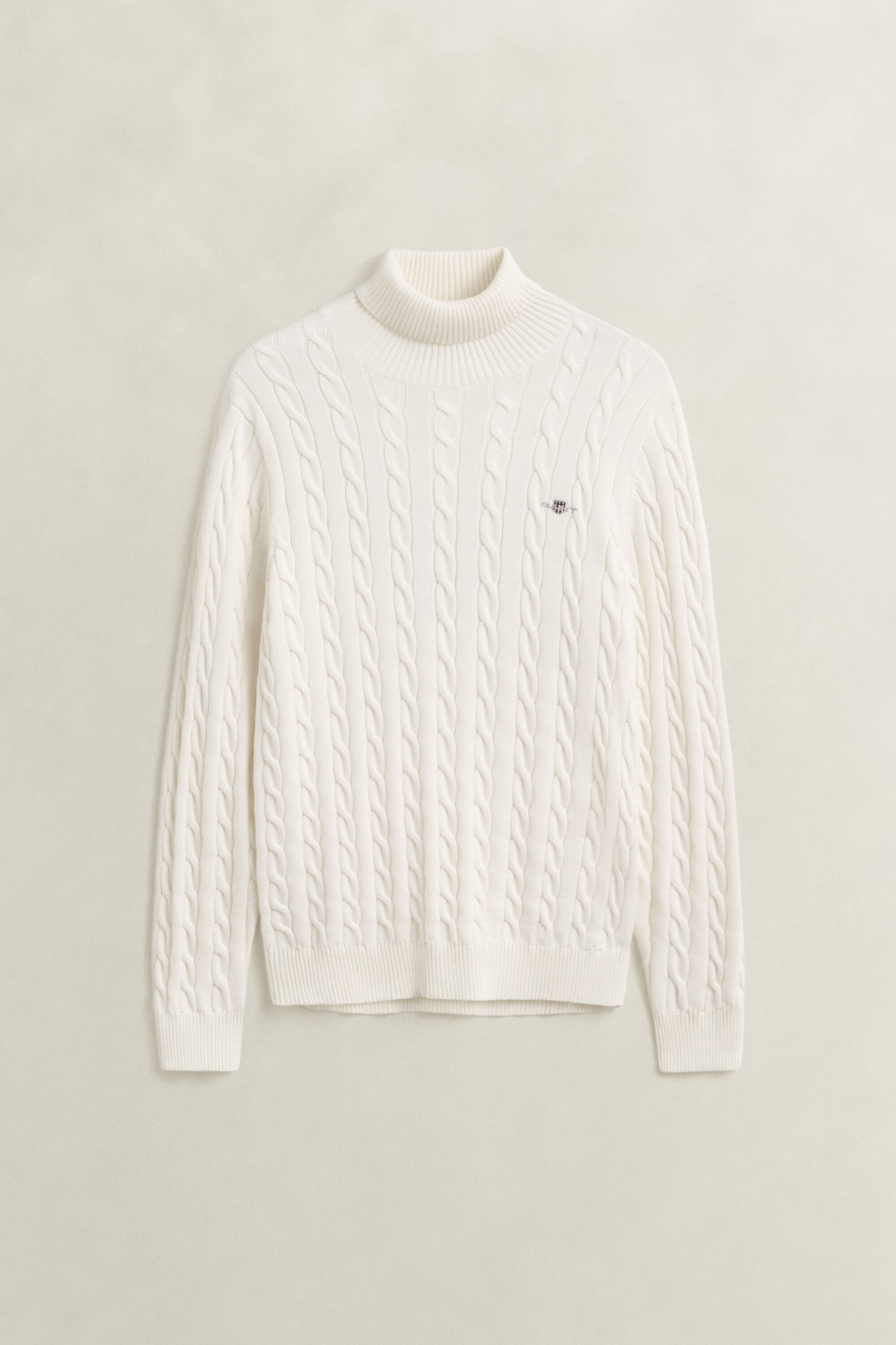 Kabelstrikket sweater af bomuld med rullekrave