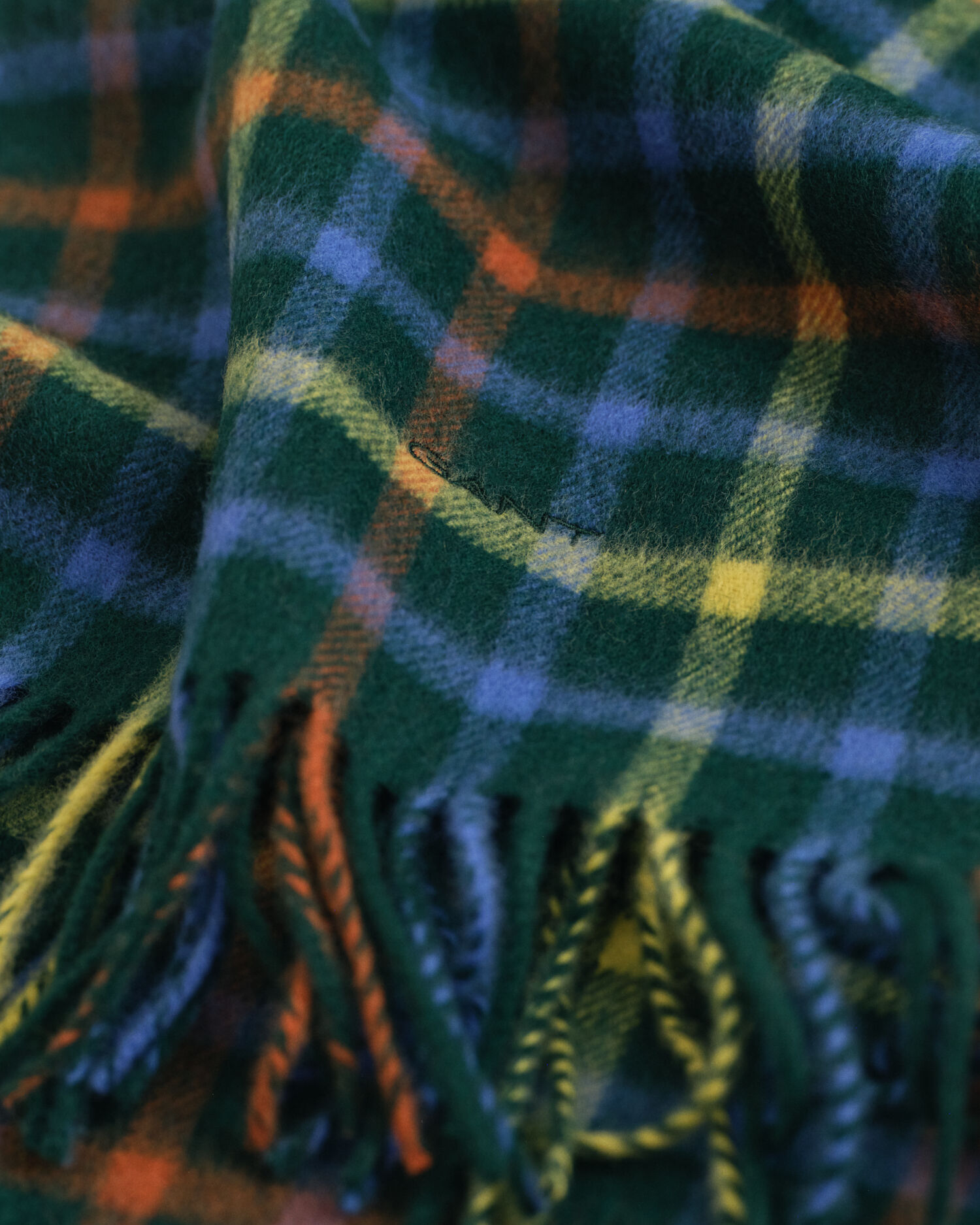 Ternet uldhalstørklæde