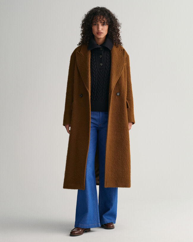 Kabelstrikket sweater med knappet rullekrave