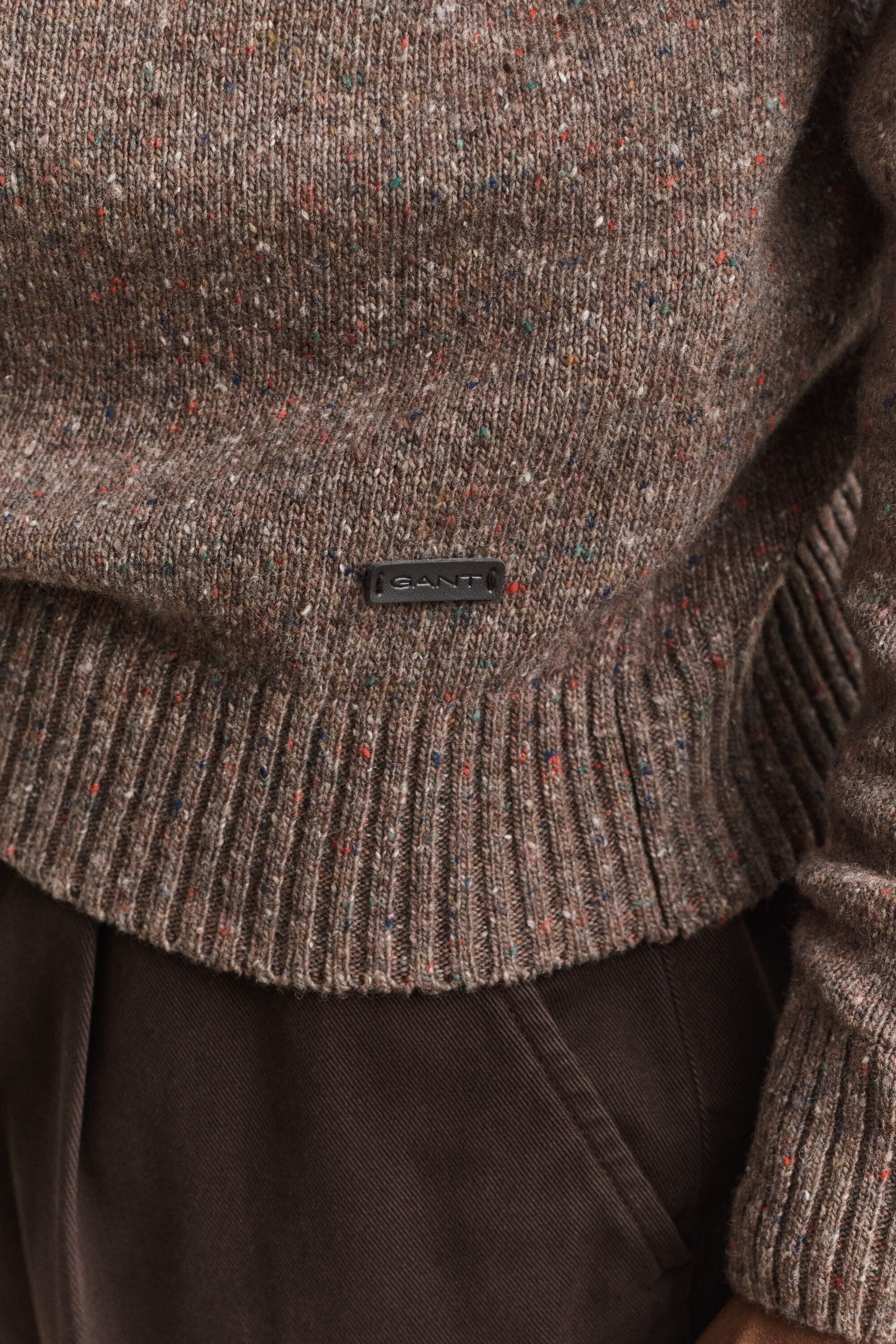 Polosweater i uldblanding med nister