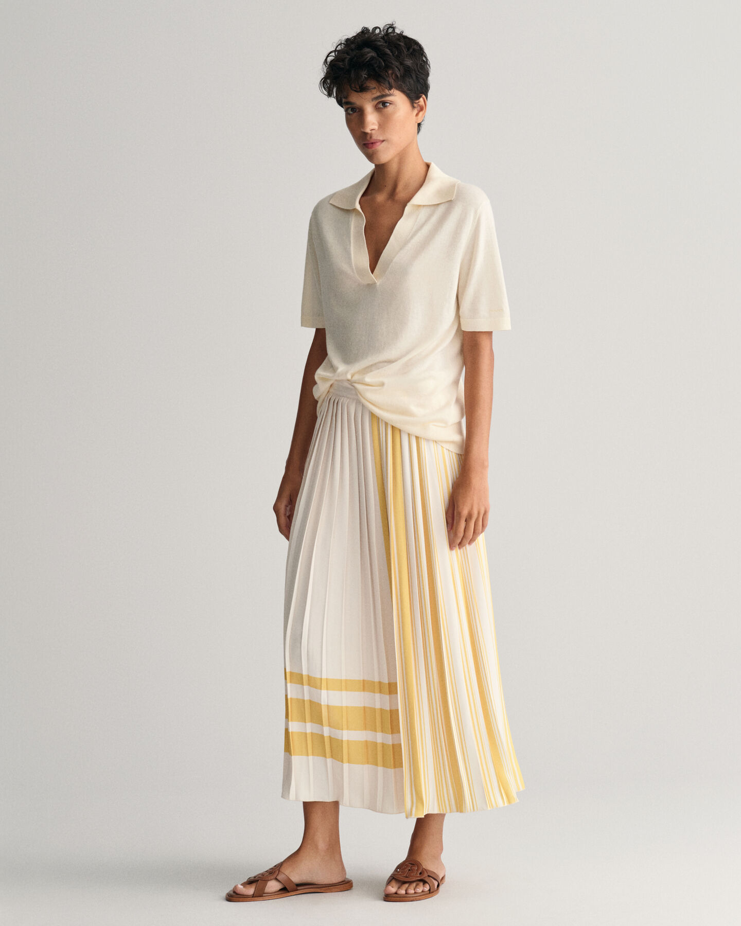 Stribet plisseret nederdel