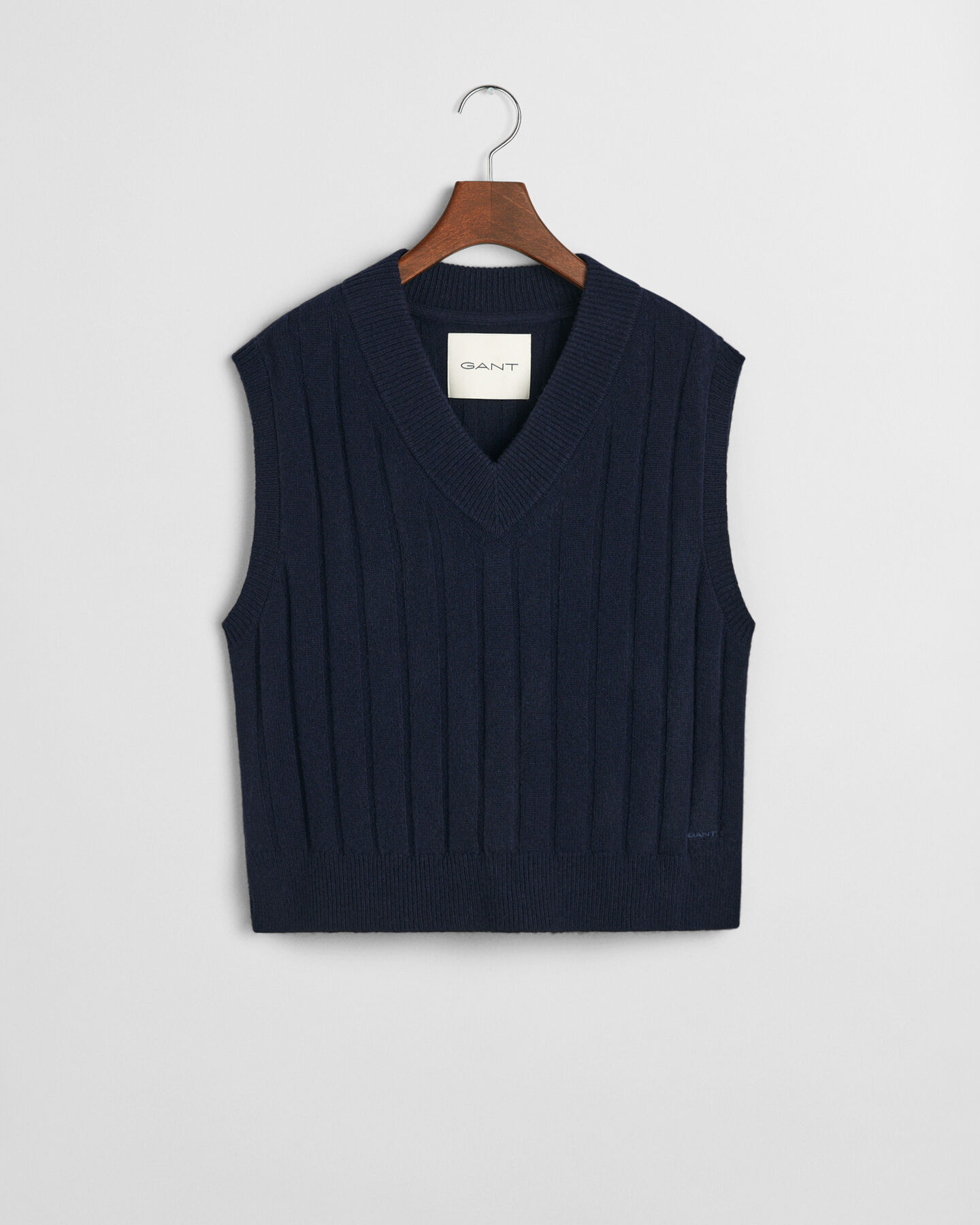 Sweater-vest i uld med bred ribstrik og V-hals