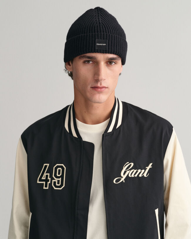 Ribstrikket beanie i bomuld