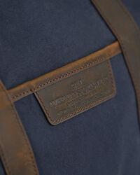 Rejsetaske i vokset bomuld