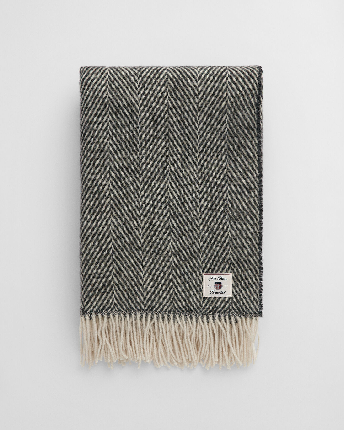 Sildebensmønstret uldtæppe