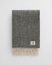 Sildebensmønstret uldtæppe