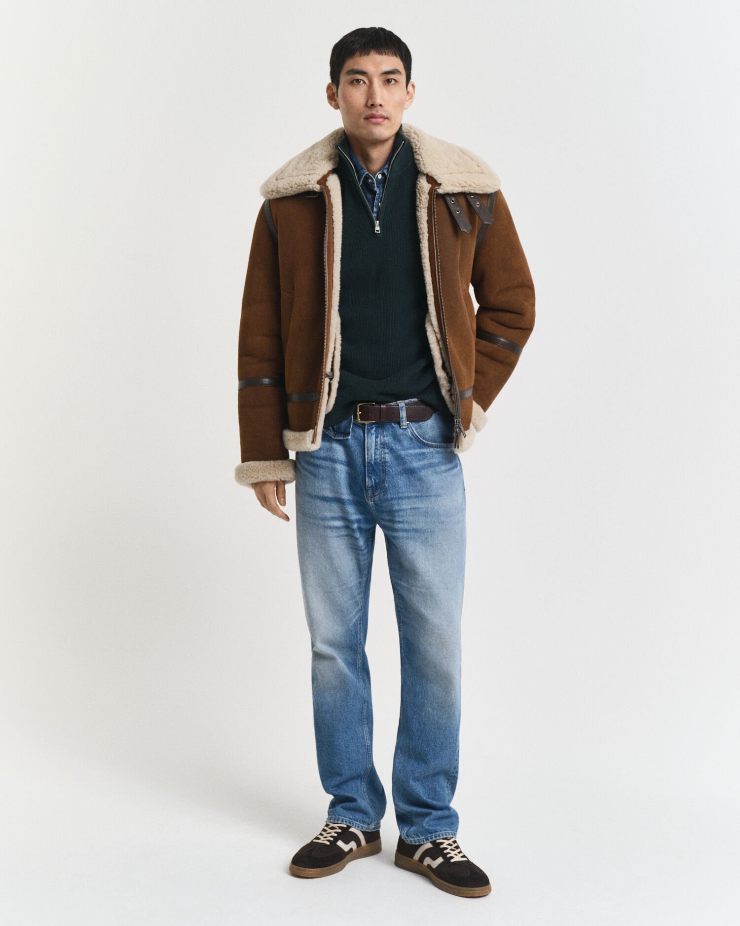 Ribstrikket sweater af bomuld og merinould med halv lynlås