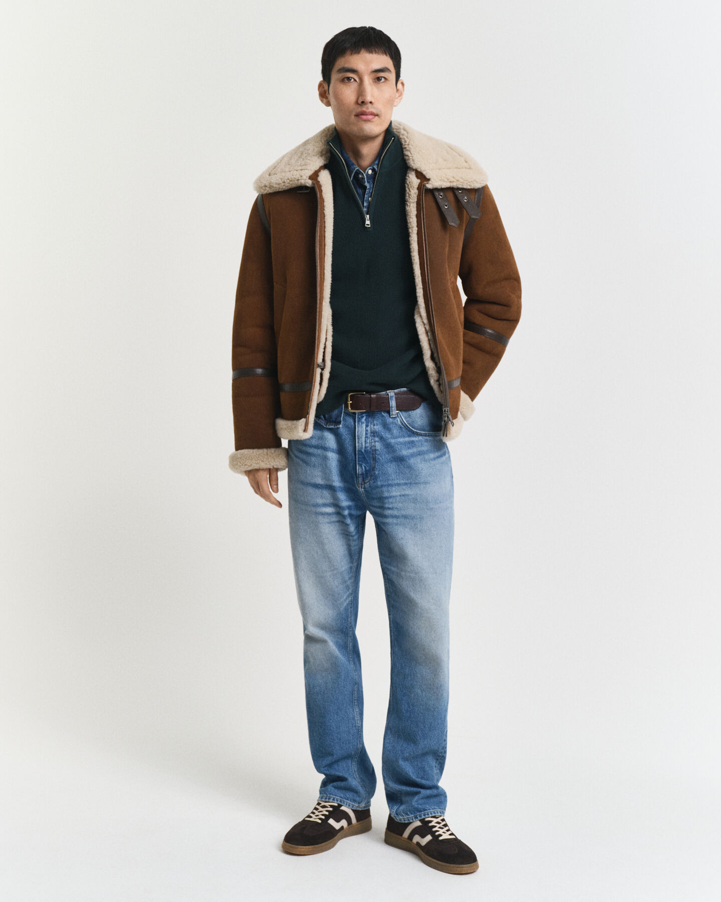 Ribstrikket sweater af bomuld og merinould med halv lynlås