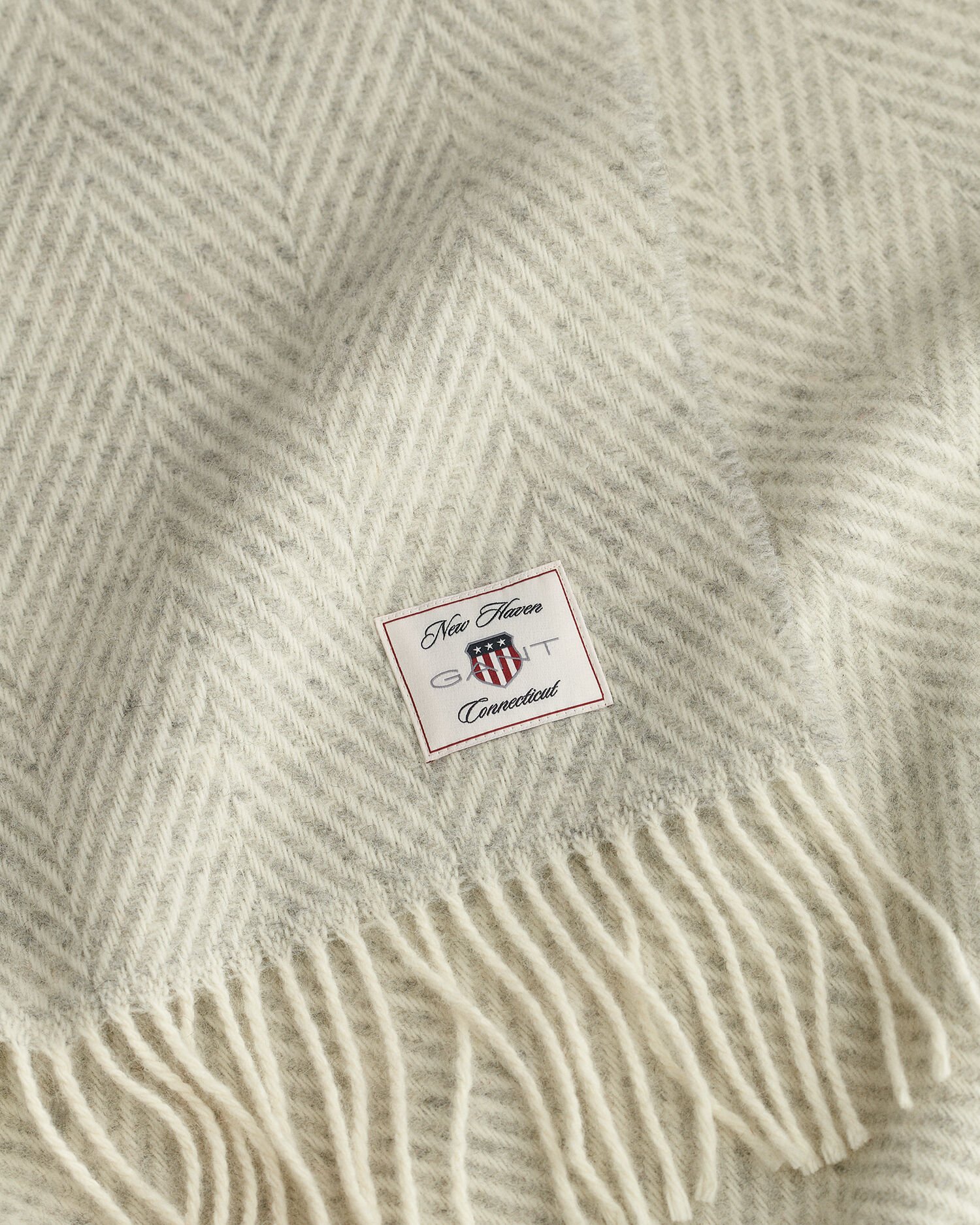 Sildebensmønstret uldtæppe