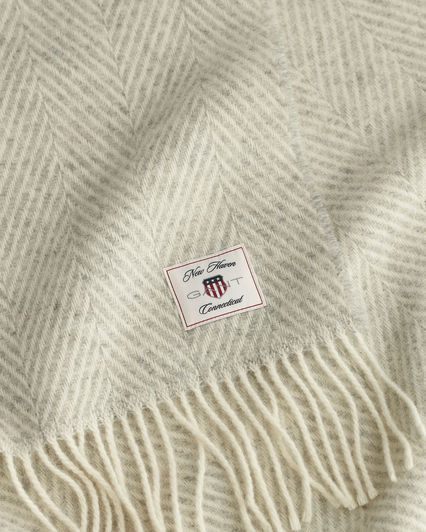 Sildebensmønstret uldtæppe