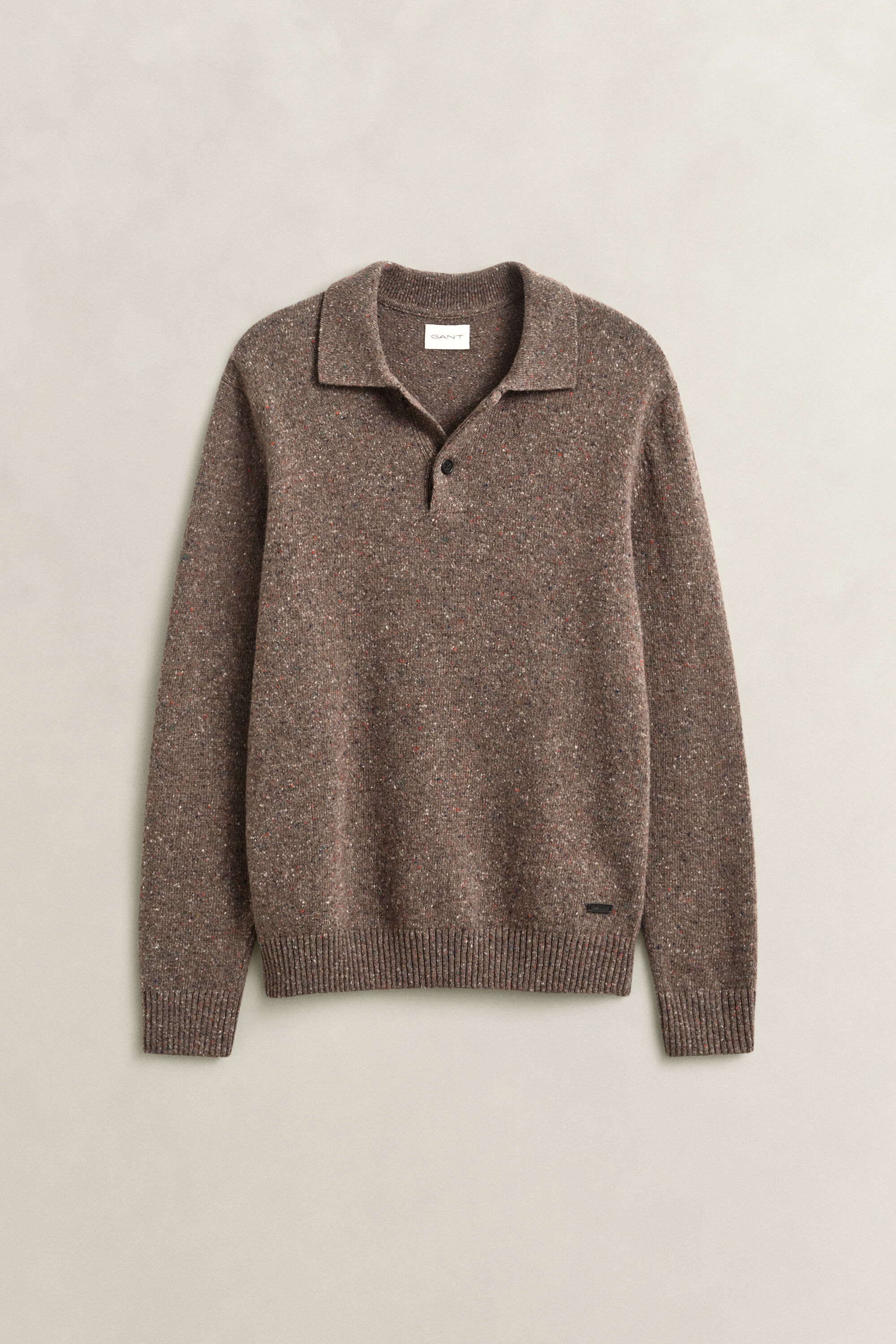Polosweater i uldblanding med nister
