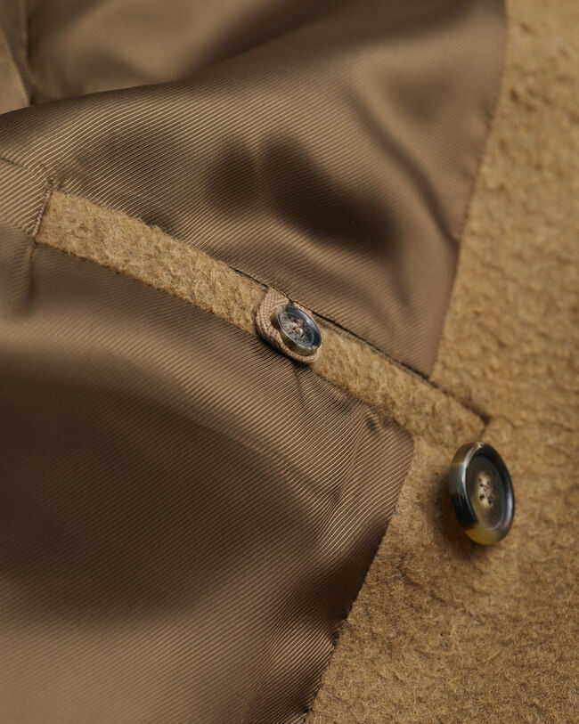 Dobbeltradet uldfrakke