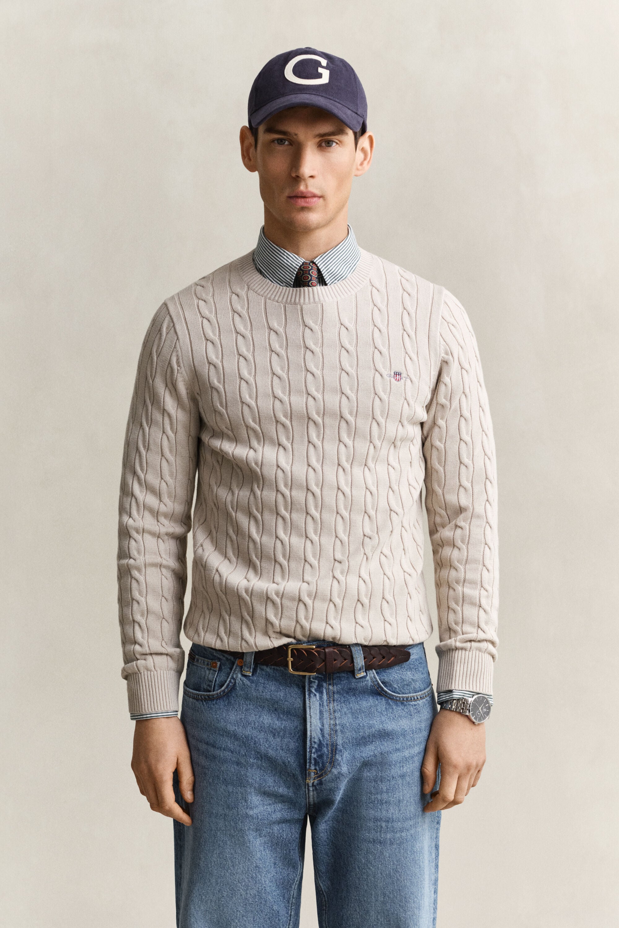 Crewneck sweater af bomuld med kabelstrik