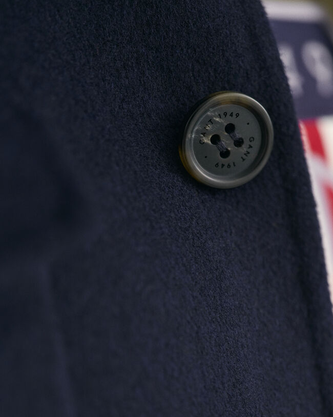 Håndsyet jakke med 4 lommer