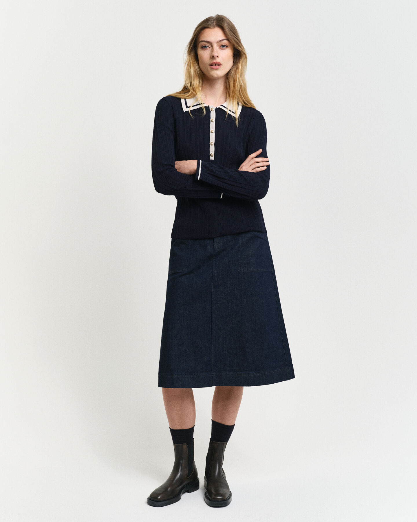 Ribstrikket polosweater med kontrastfarver