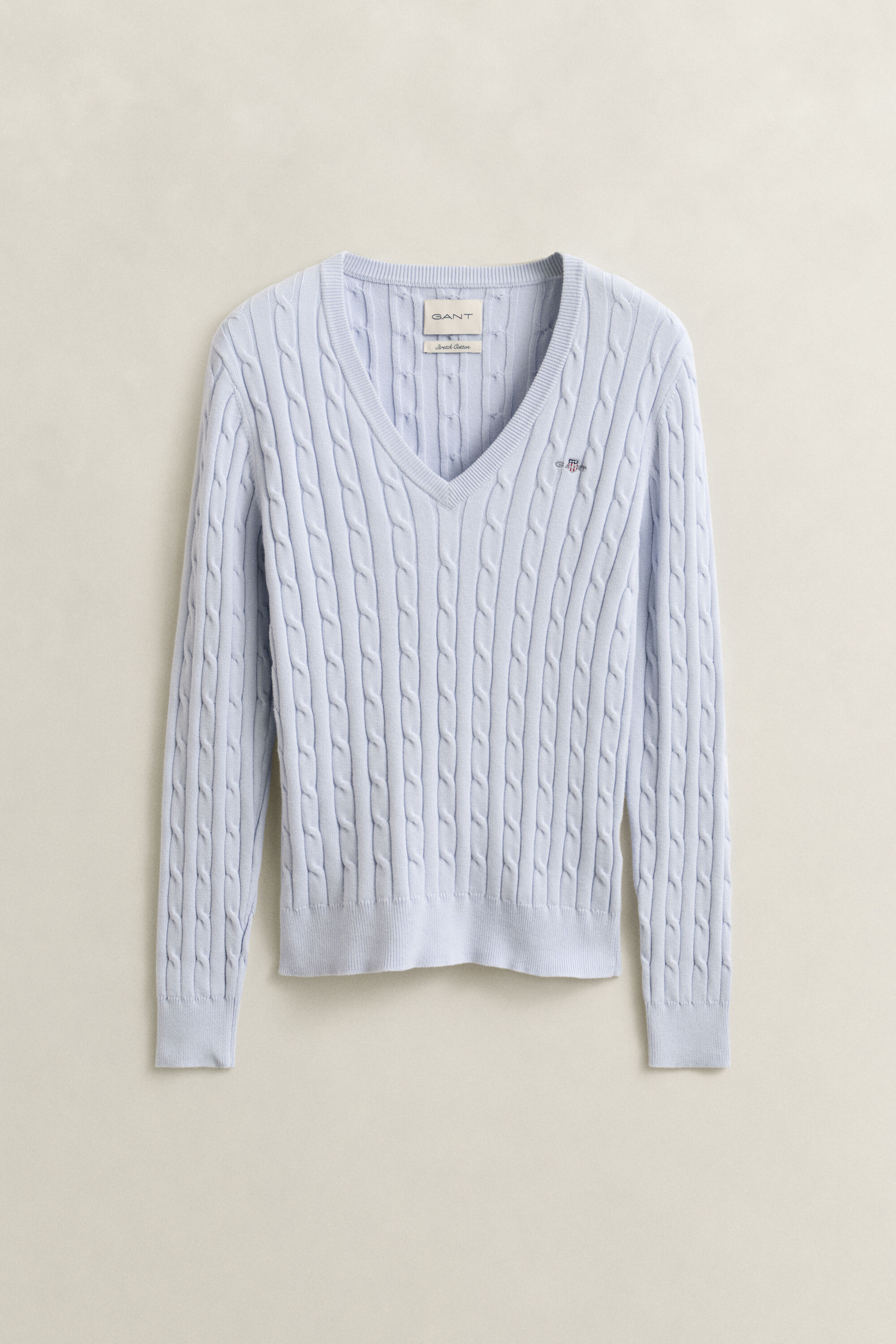 Kabelstrikket sweater med V-hals