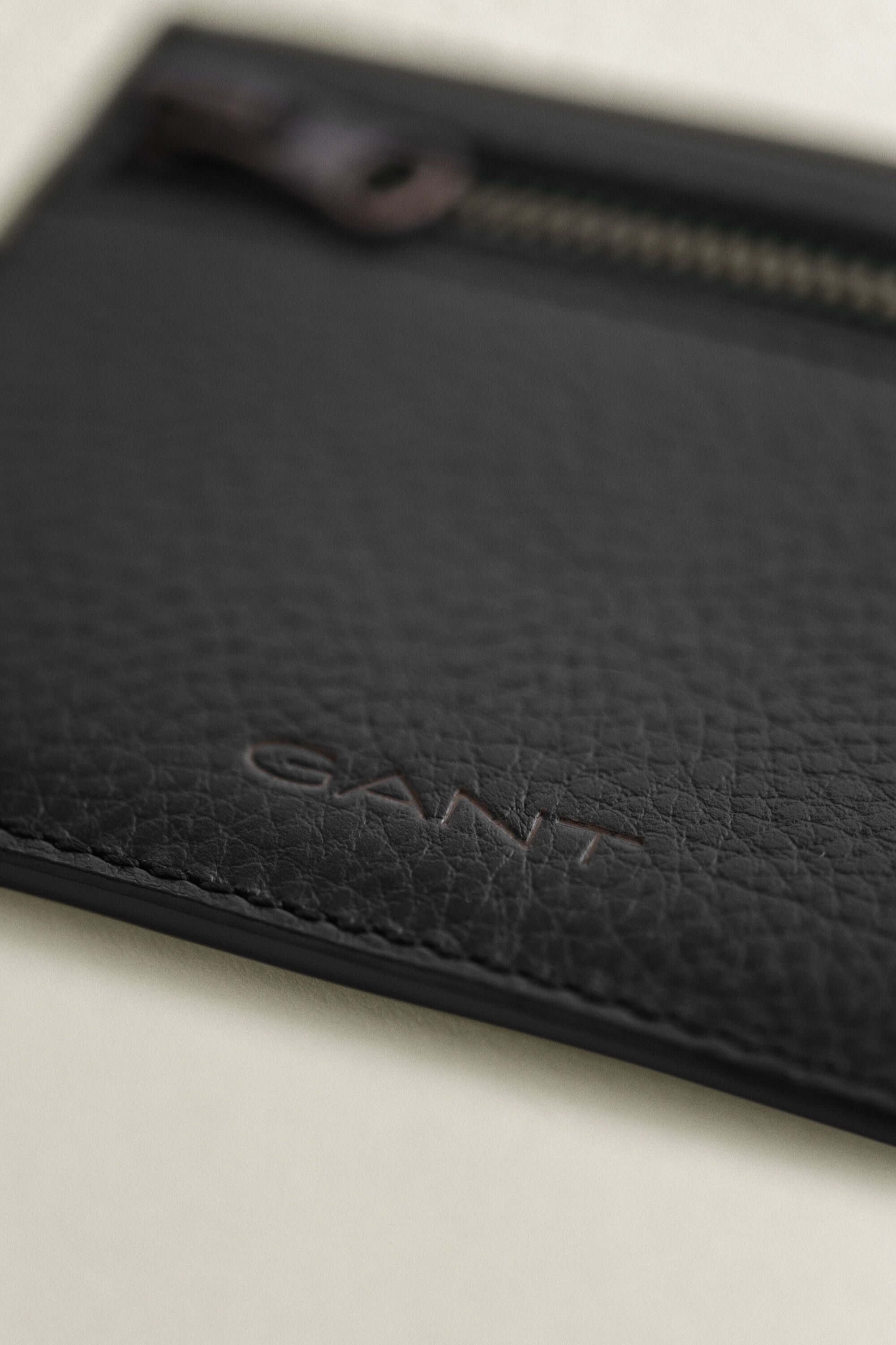 Kortpung i præget læder