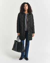 Quiltet frakke med kanter i jernbanefløjl