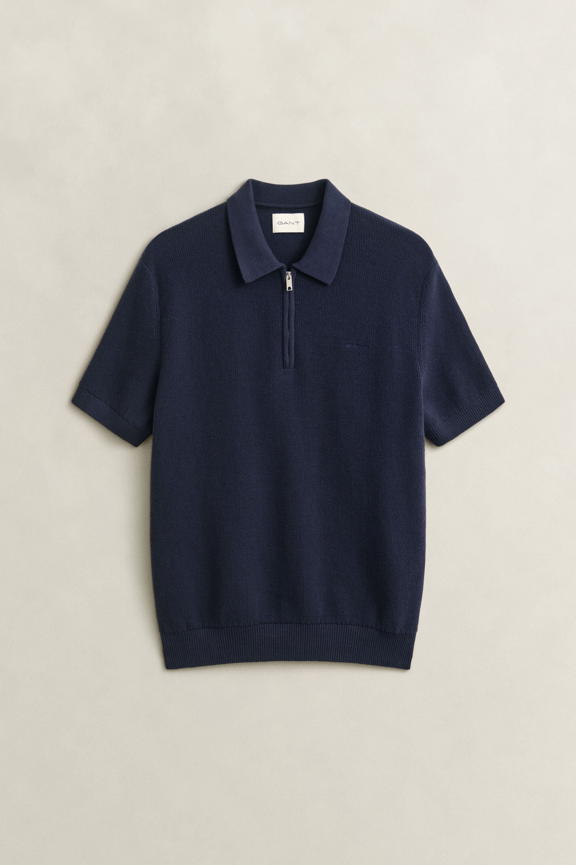 Ribstrikket polosweater i bomuld
