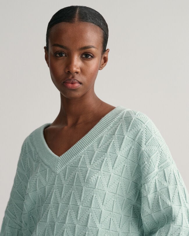 Sildebensm&oslash;nstret sweater med V-hals