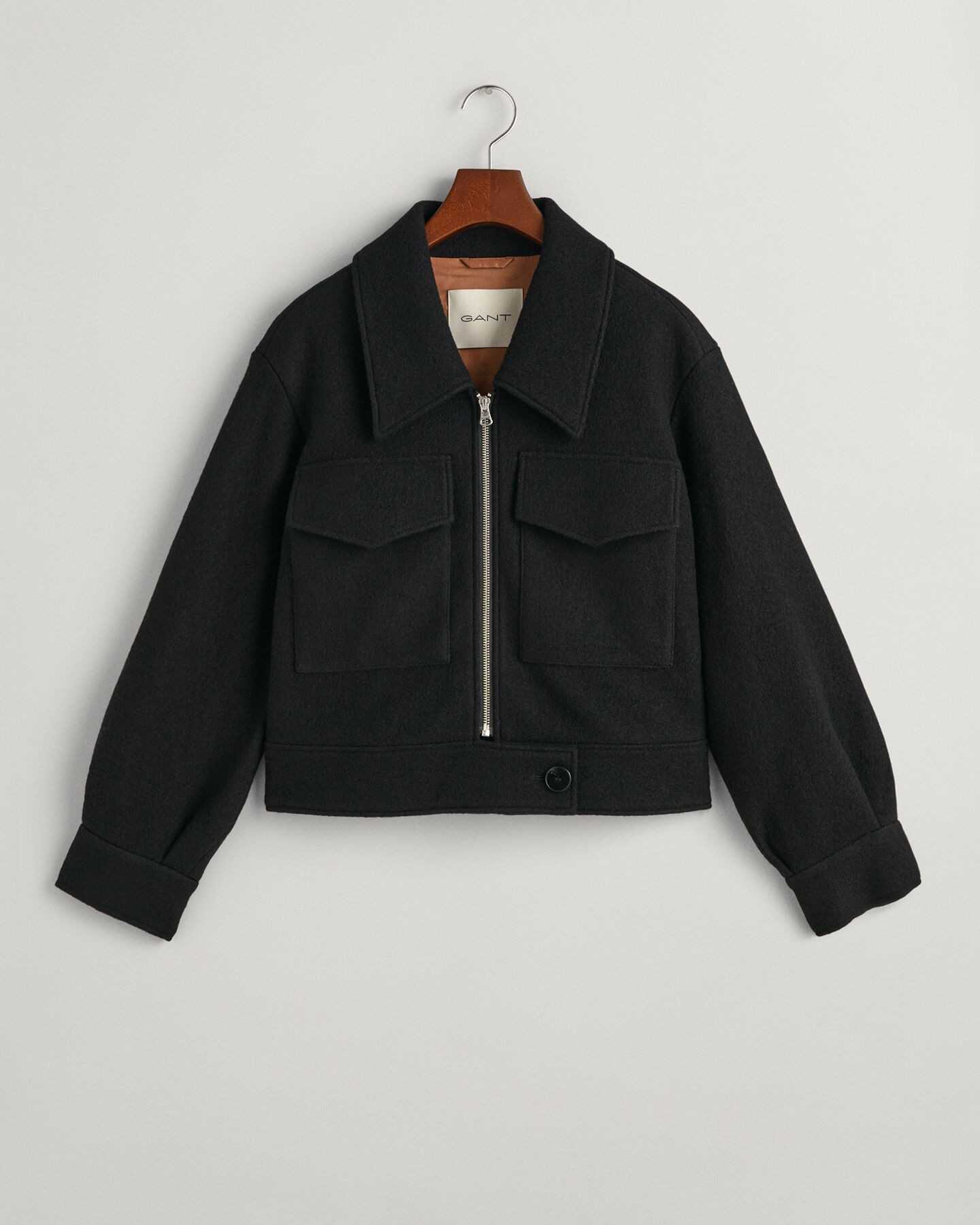 Boucl&eacute; jakke med lynl&aring;s