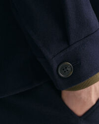 Håndsyet jakke med 4 lommer