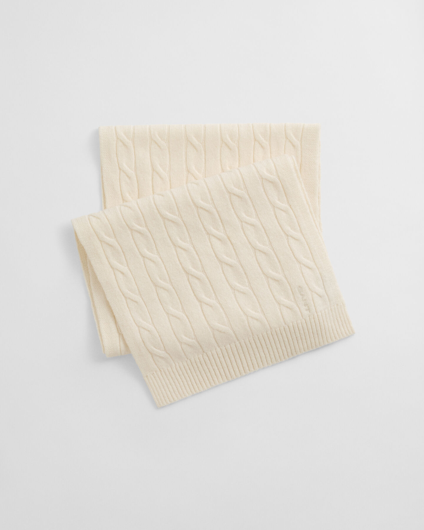 Kabelstrikket halstørklæde i uld