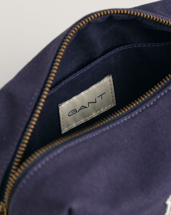 Farvet Shield toilettaske