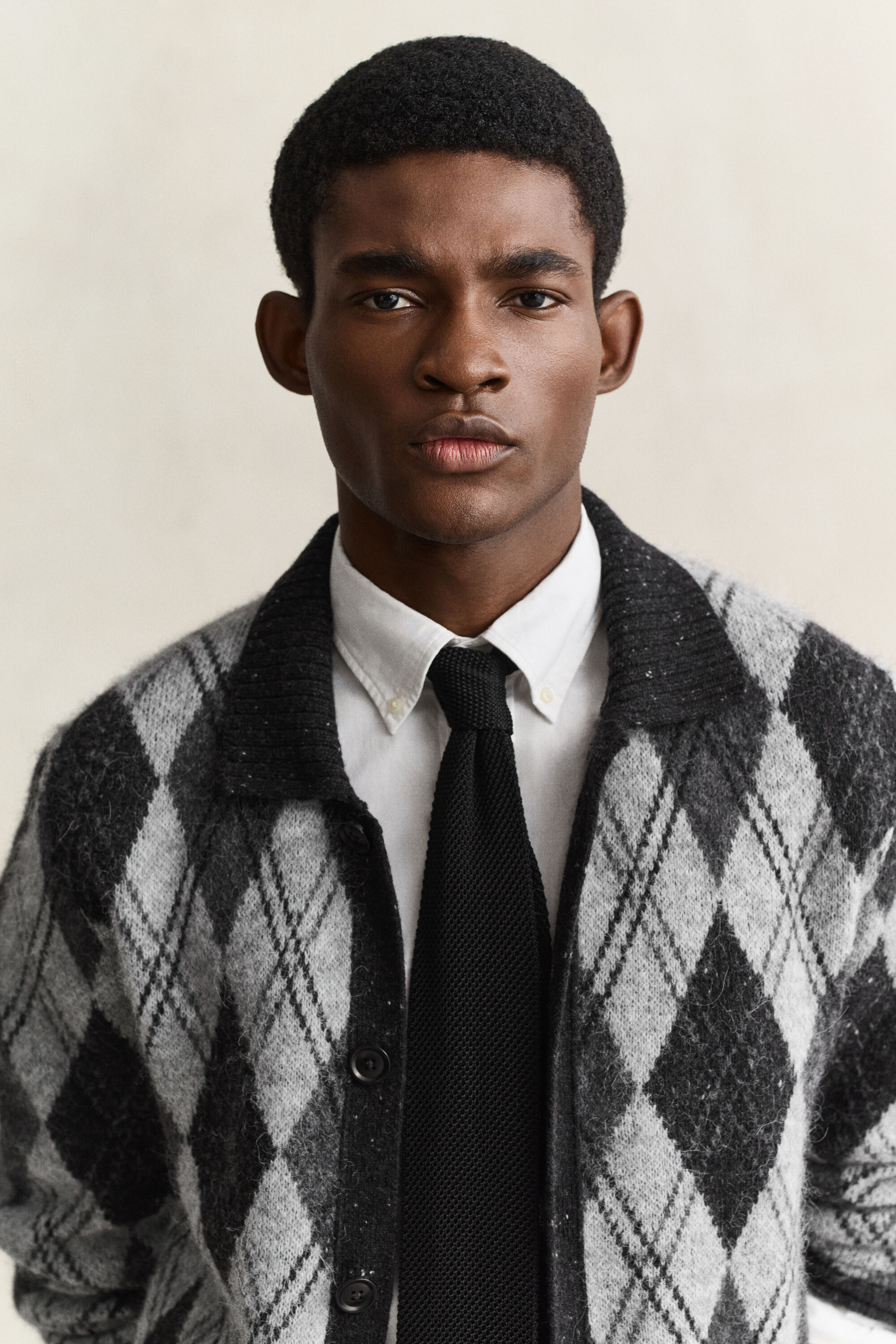 Argyle polo cardigan i en alpakauldblanding