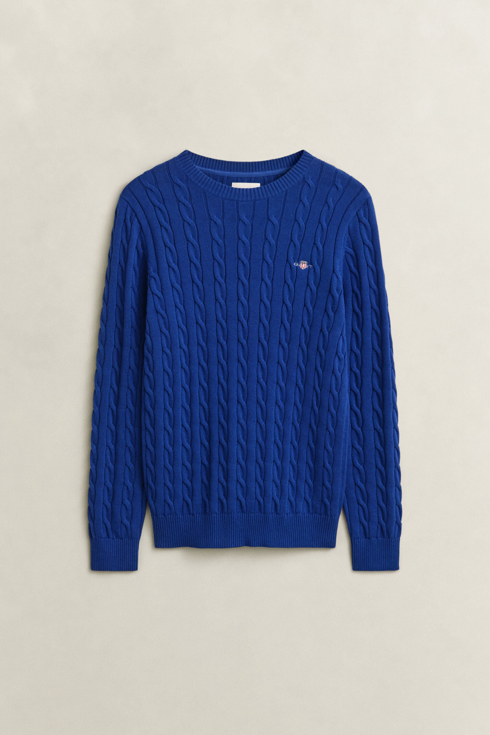 Crewneck sweater af bomuld med kabelstrik