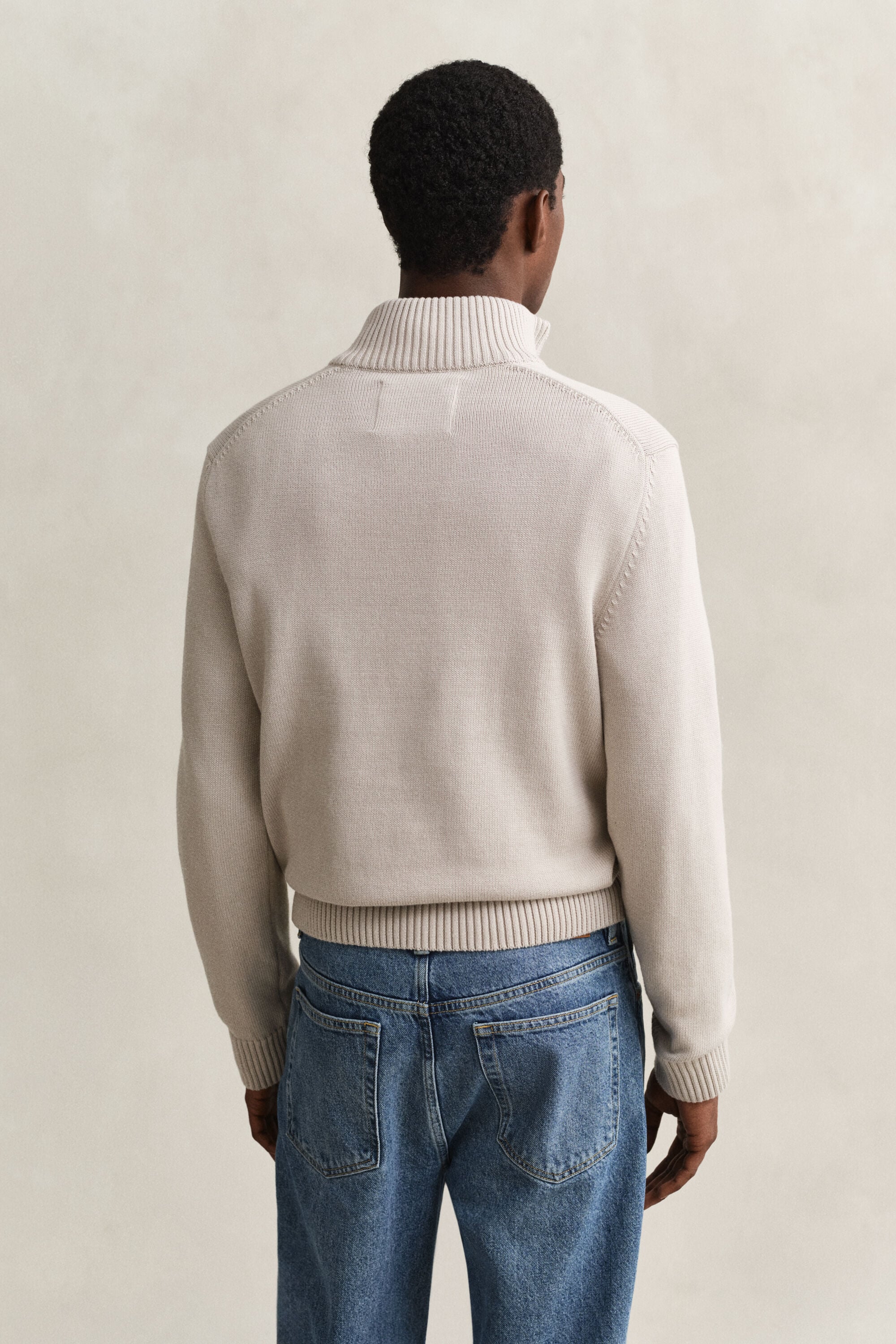 Afslappet sweater i bomuld med halv lynlås