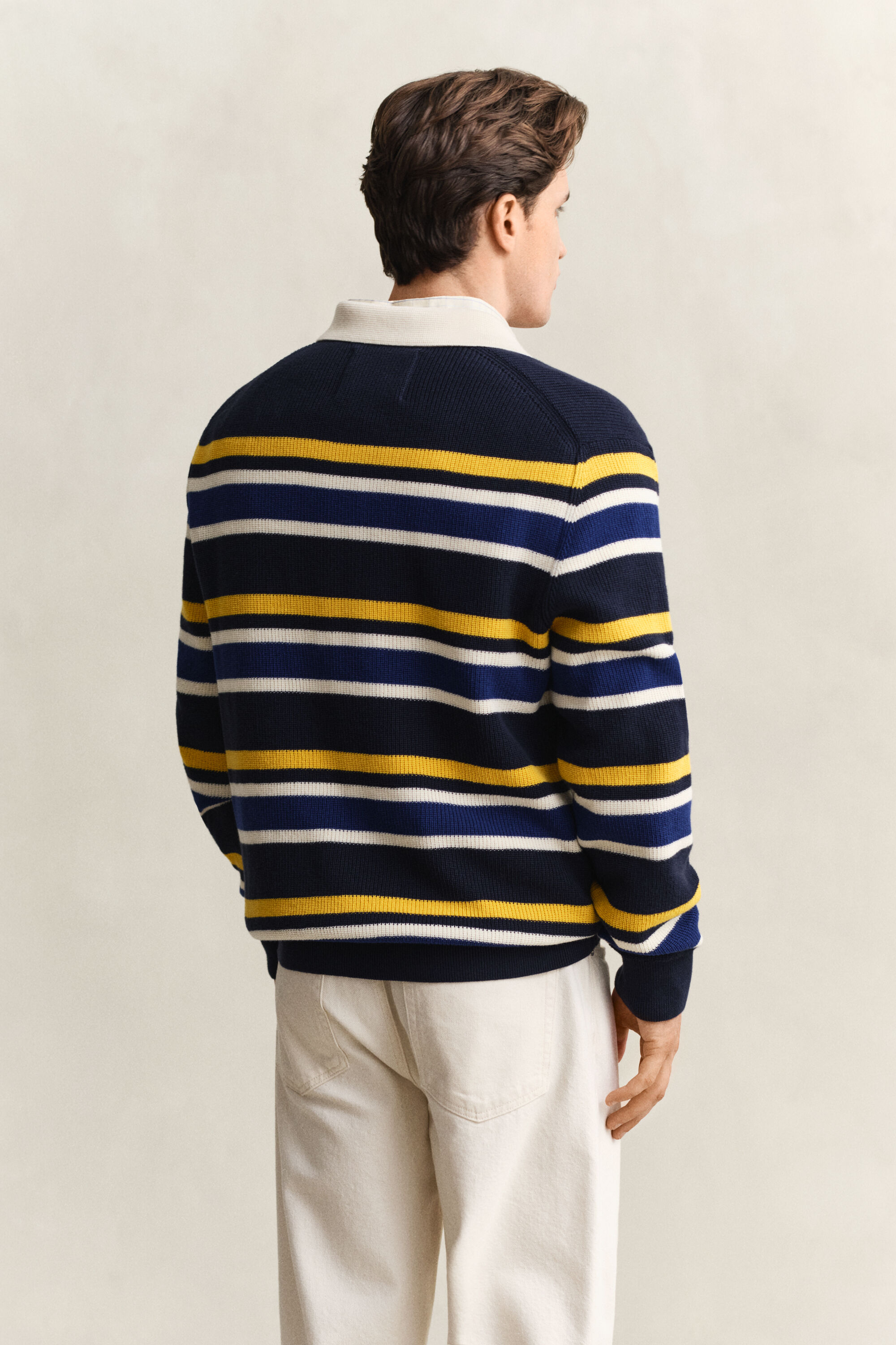 Stribet polosweater med ribstrik
