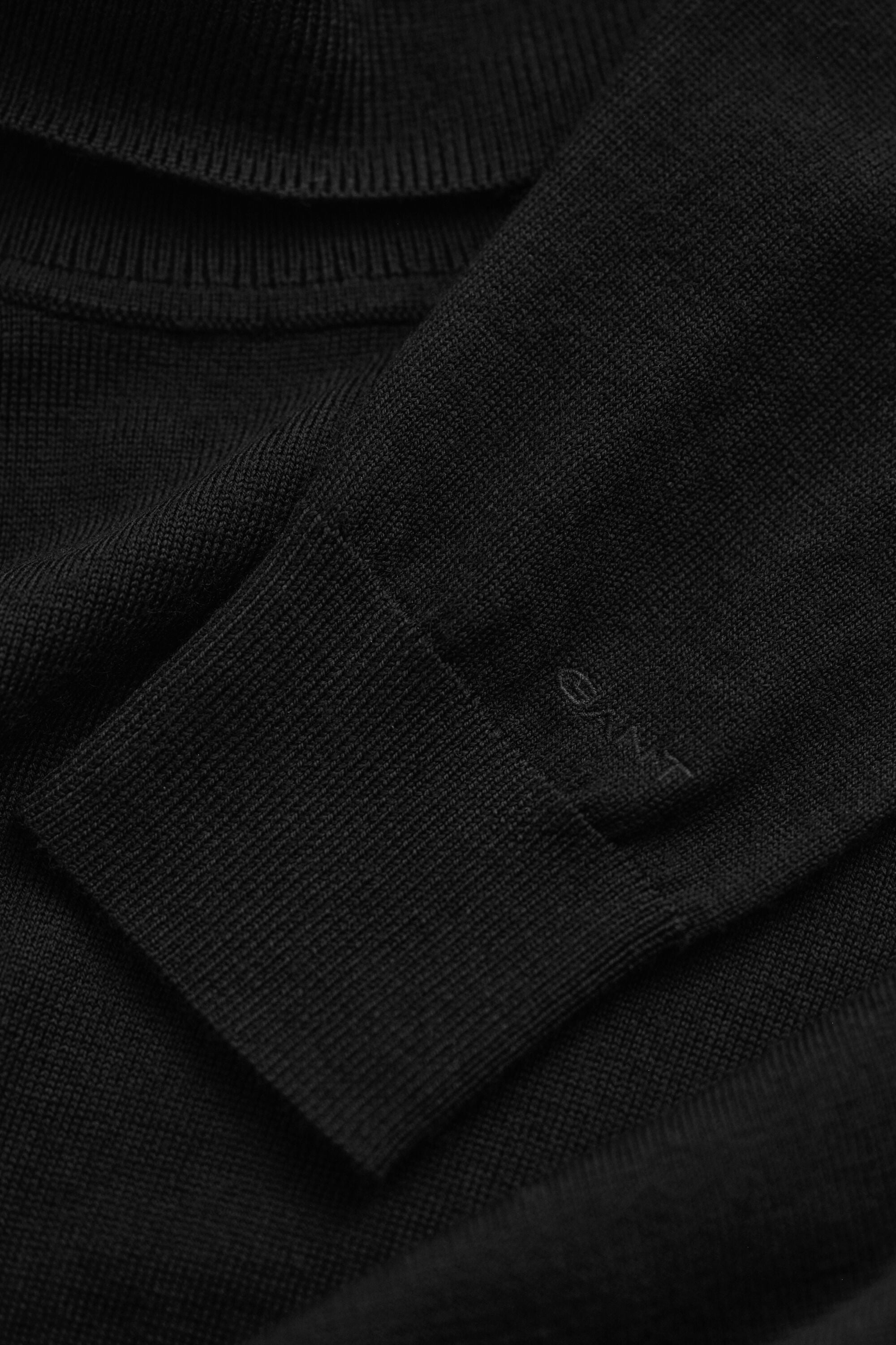 Rullekrave sweater af ekstra fin merinould