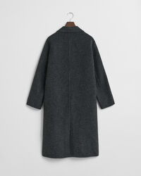 Ternet håndsyet frakke