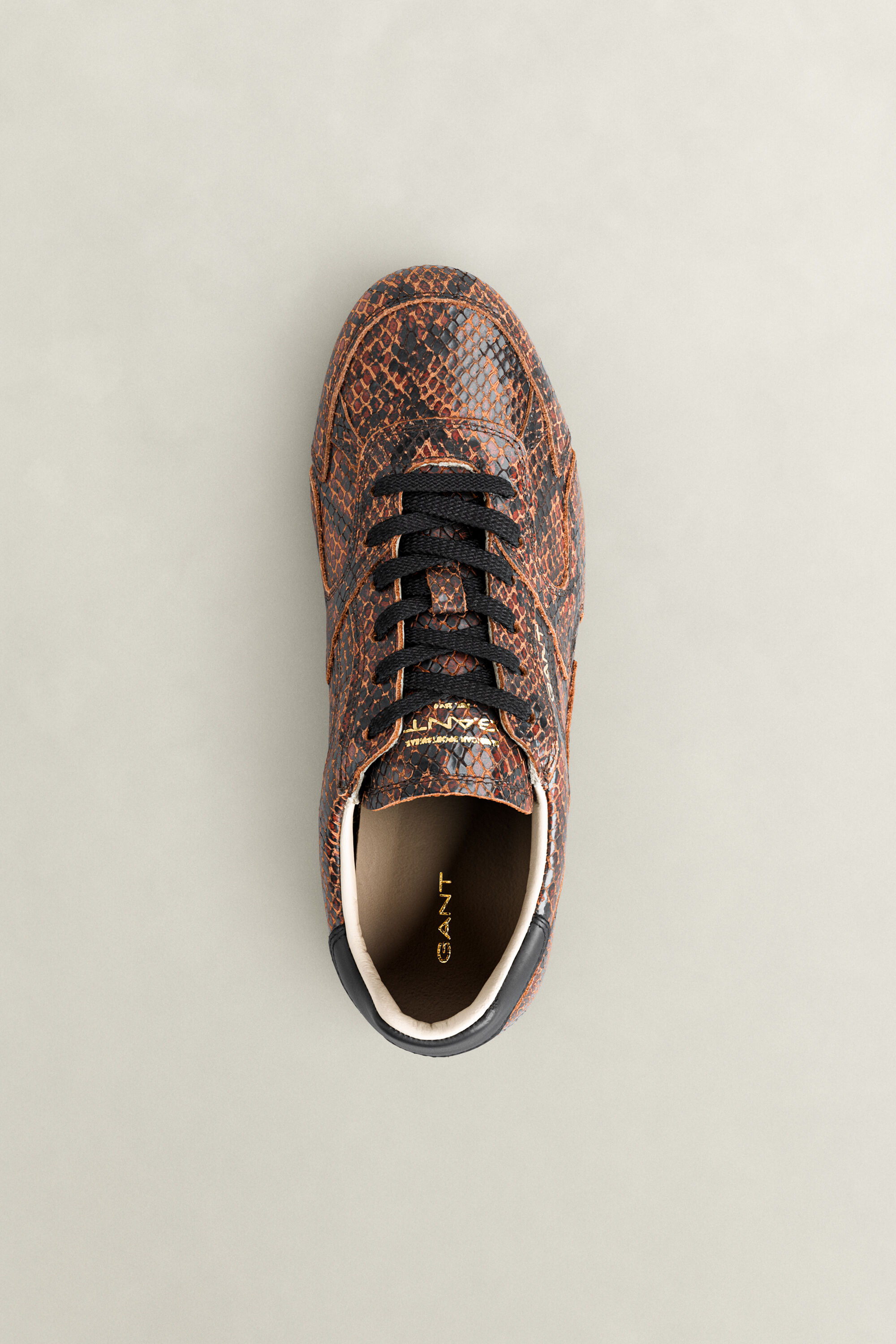 Sperly lædersneakers med prægning af slangeskind