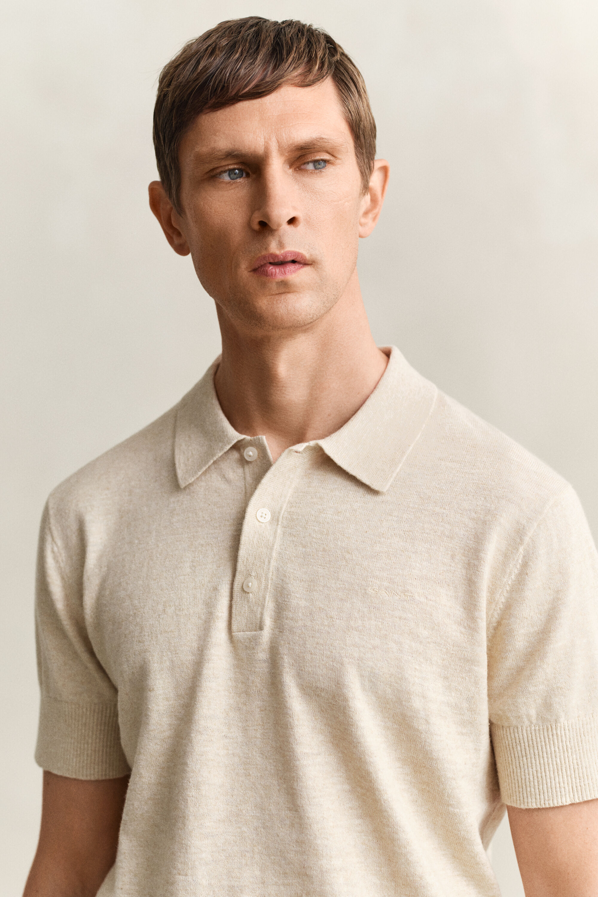 Kortærmet polosweater af nopret bomuldsblanding