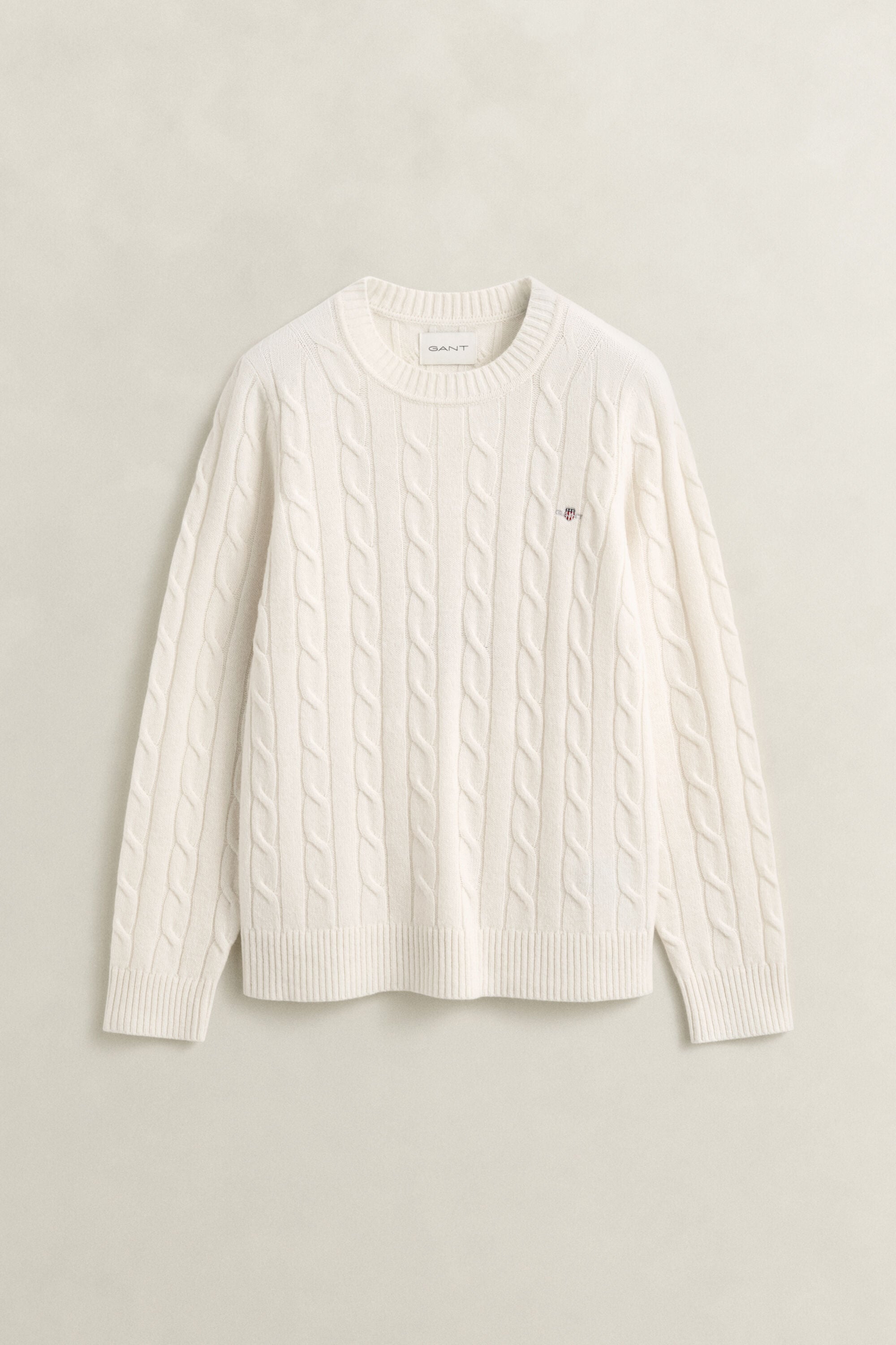 Sweater af lammeuld med kabelstrik