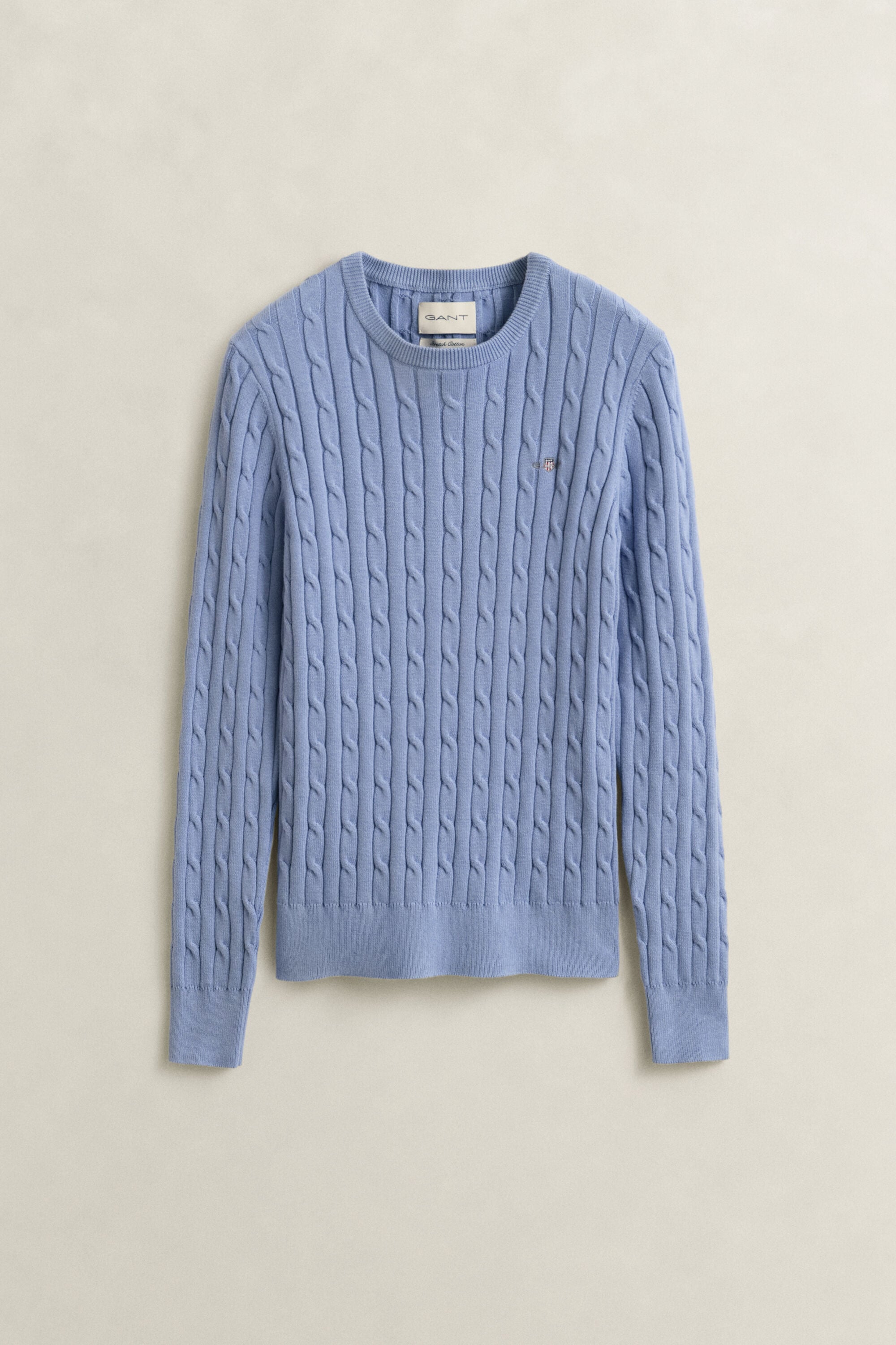 Crewneck sweater af strækbomuld med kabelstrik