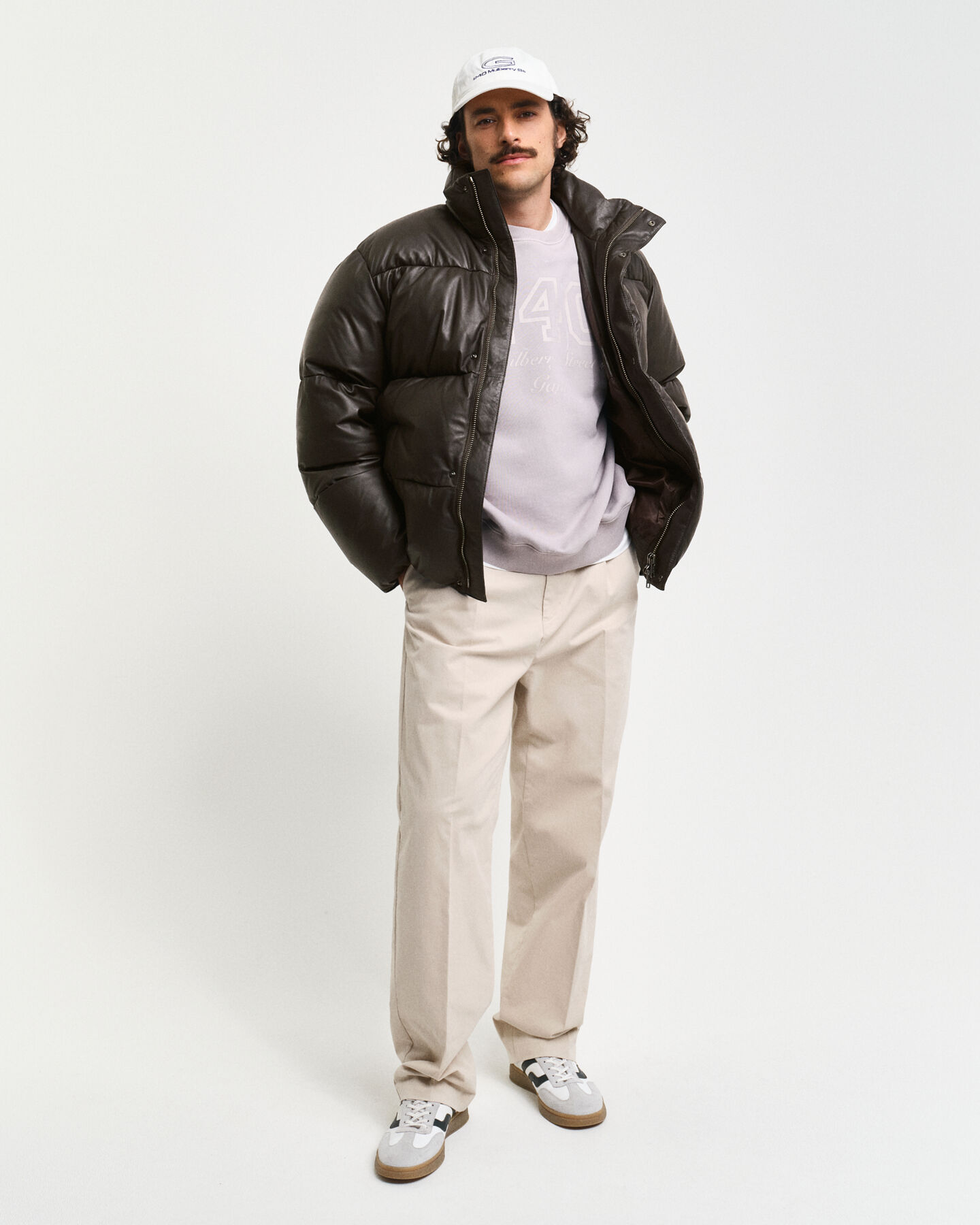 Pufferjakke i læder med gåsedun