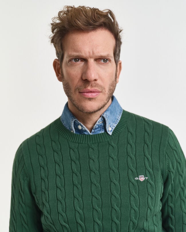 Crewneck sweater af bomuld med kabelstrik