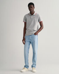 Piqu&eacute; poloskjorte med kontrastfarvede striber